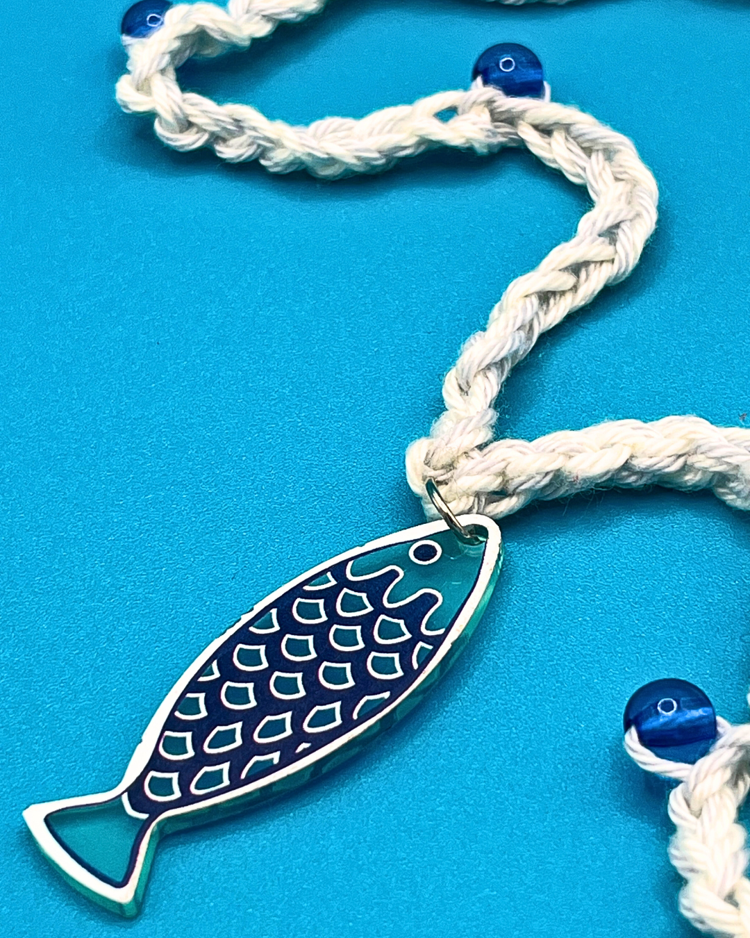 Crochet blu fish necklace