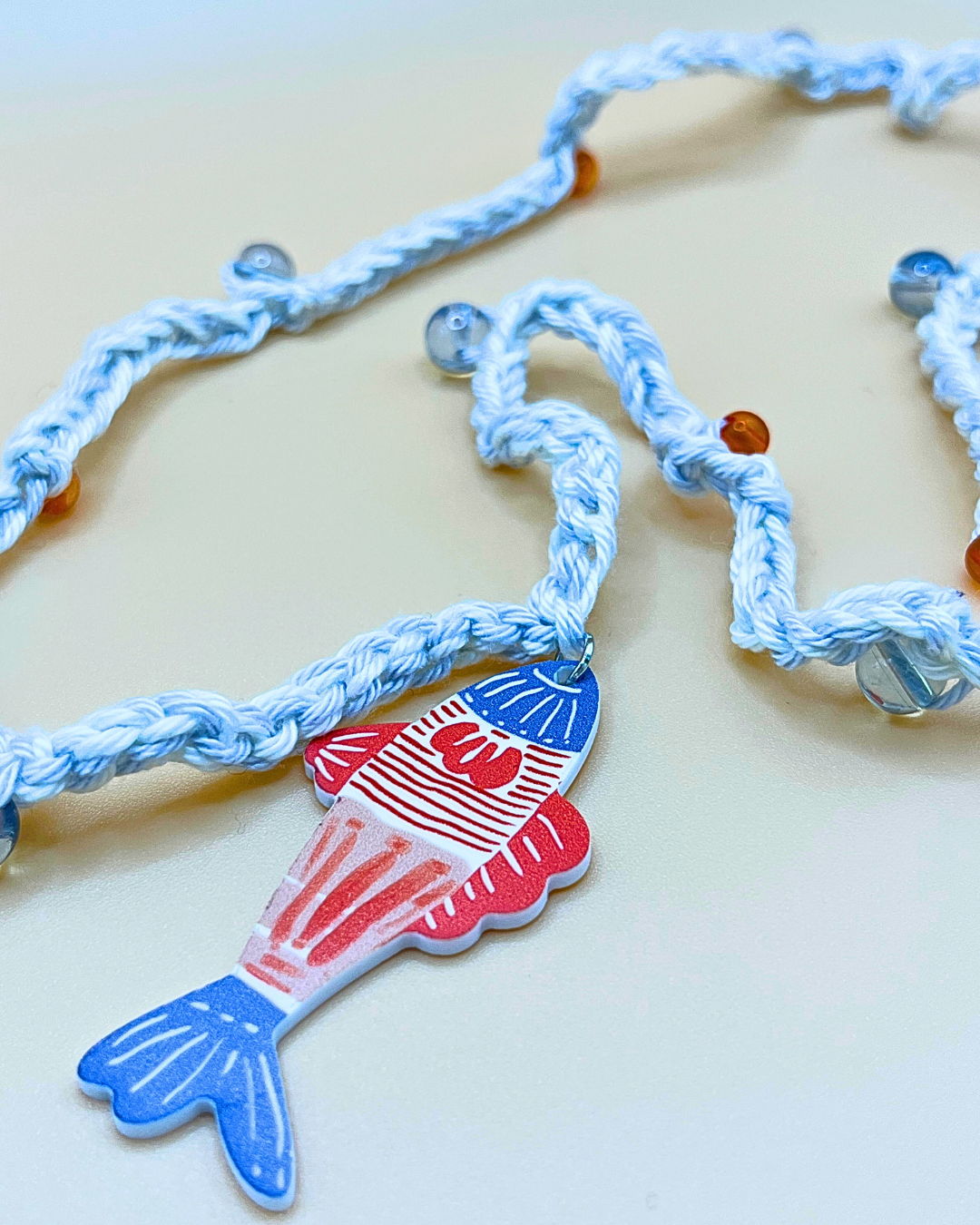 Crochet pink fish necklace